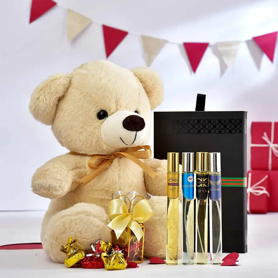 Heavenly Chocolates and Romantic Gifts Delight hamper featuring a teddy bear, perfume set, and homemade chocolates.