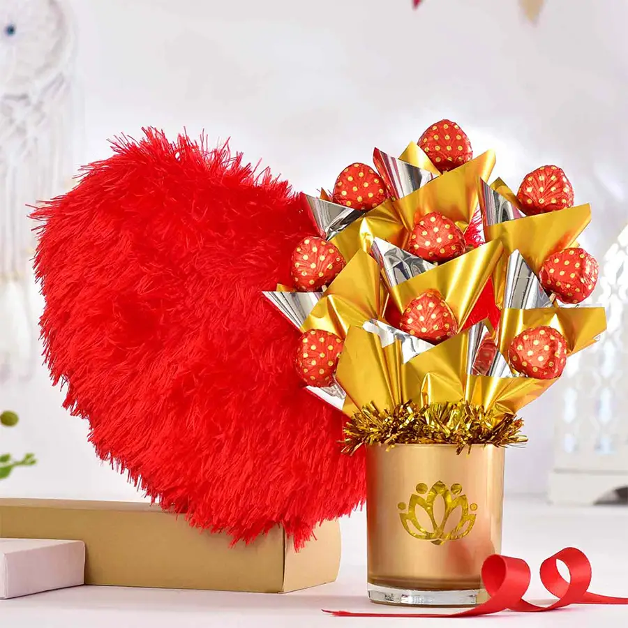 Valentine's Day gift hamper featuring nine homemade chocolates in a stylish glass pot and a 10-inch red heart soft toy
