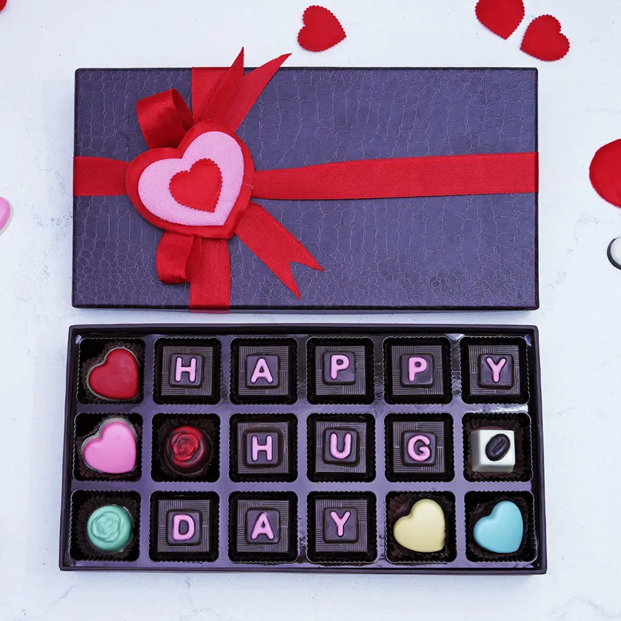 Tempting Flavoured Chocolates Gift Box with assorted handcrafted chocolates in various flavors arranged elegantly