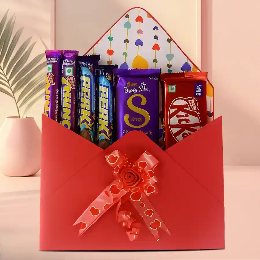 Yummy Choco Delights Gift Box featuring Nestle Munch Wafer Chocolates, Cadbury Perk Double Chocolate Bars, Cadbury Dairy Milk Silk Bar, and Nestle KitKat