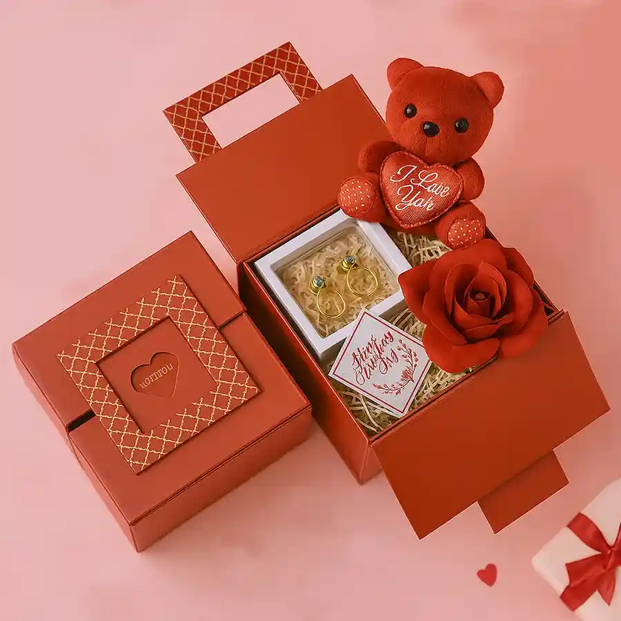 Elegance in a Box Gift Set featuring a red box with an adjustable beads bracelet, a 3-inch teddy bear, a trendy necklace, and a beautiful rose inside.
