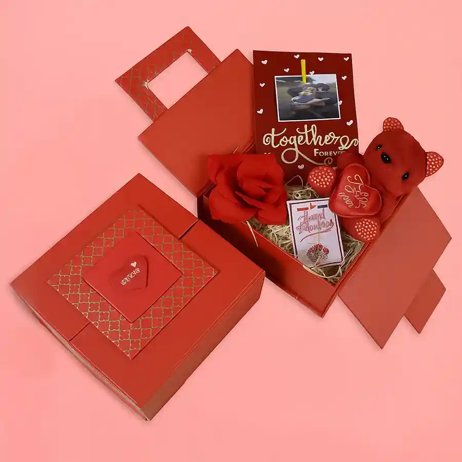 Romantic Valentine Gift Set for Her featuring a teddy bear, wall sticker, artificial rose, and necklace in a red box.