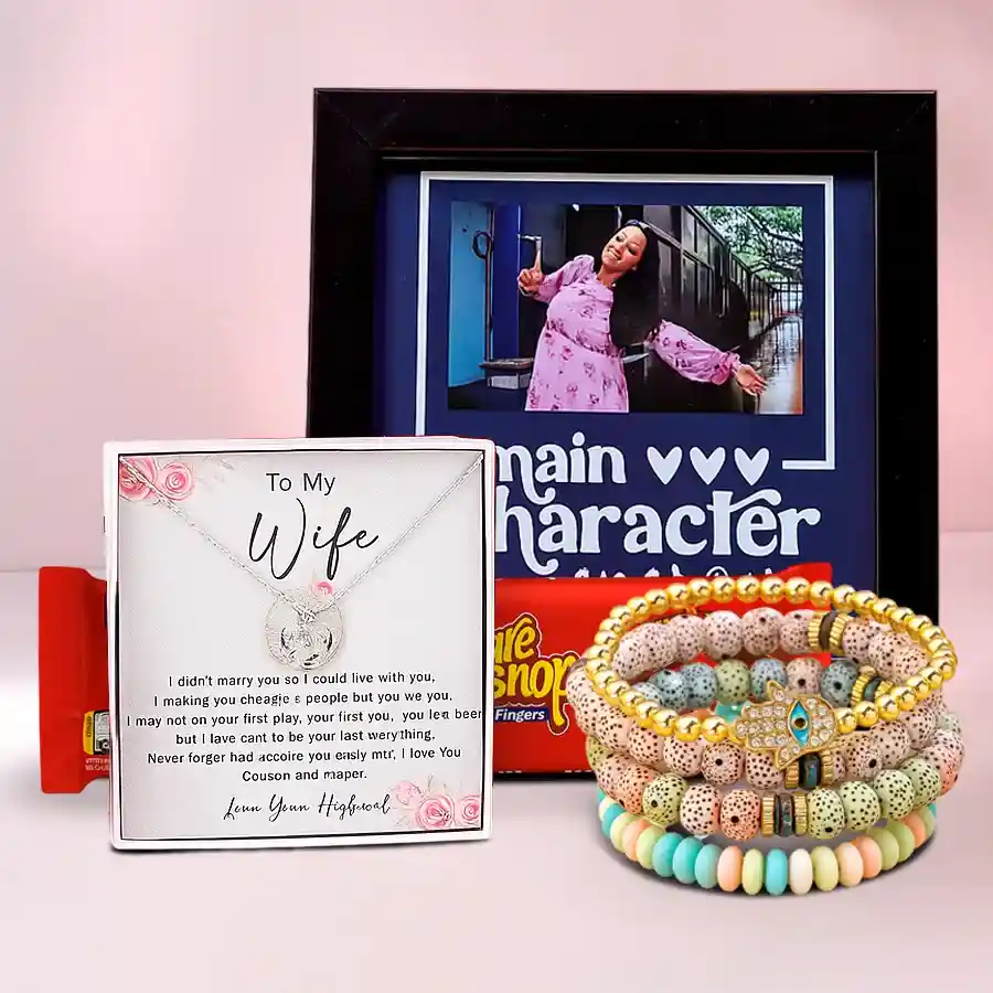 A beautifully arranged Valentine’s Day gift set including a personalized black photo frame, a trendy beads bracelet, a stylish necklace, and a 57g Kitkat Share Snap.