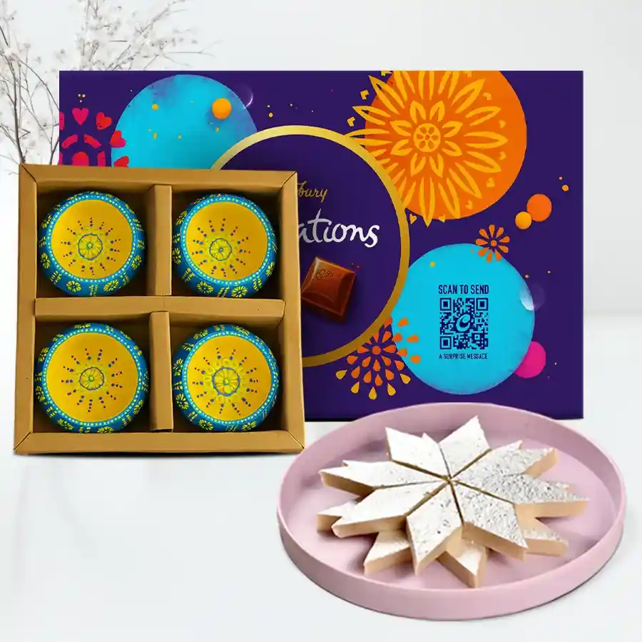 500 grams of Kaju Katli, a Cadbury Celebration chocolate pack, and four decorative wax diyas arranged for a festive celebration.