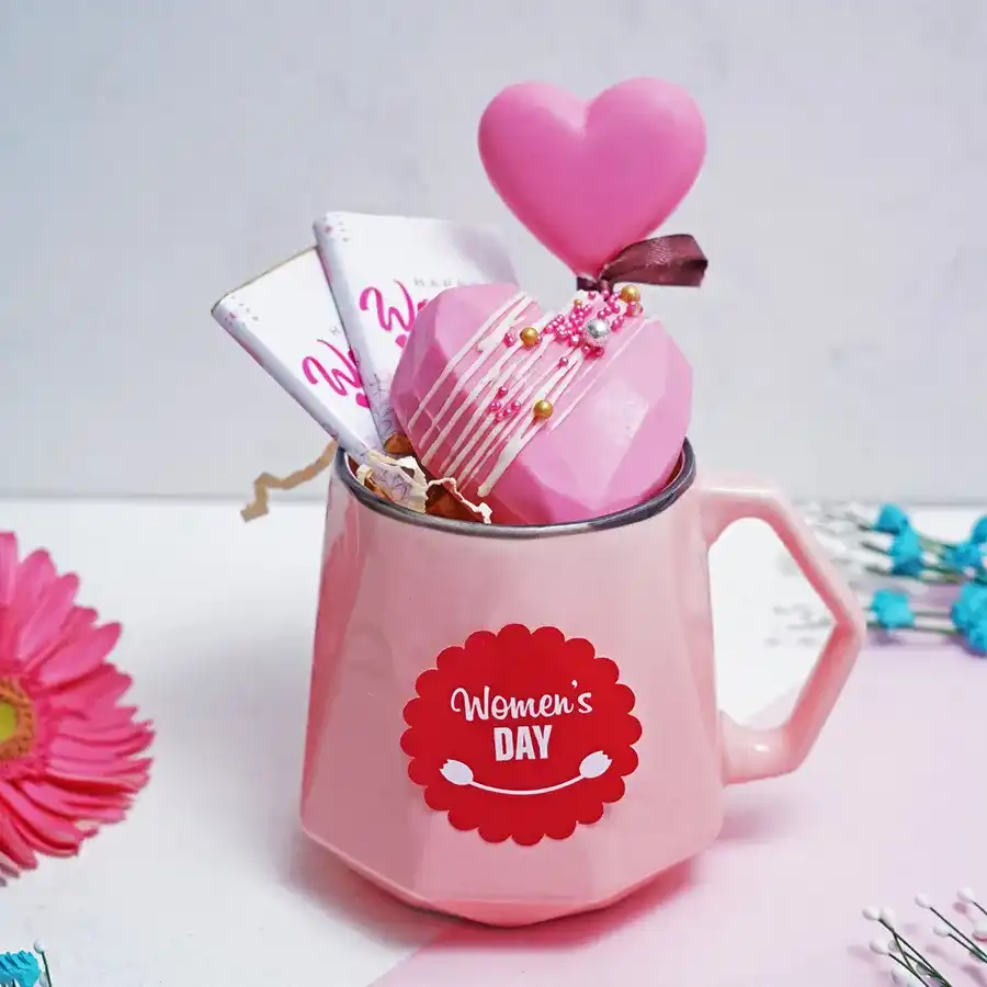 Heartwarming Treats bundle for Women’s Day featuring chocolate bars, heart-shaped hot chocolate piñata, and a heart-shaped lollipop.