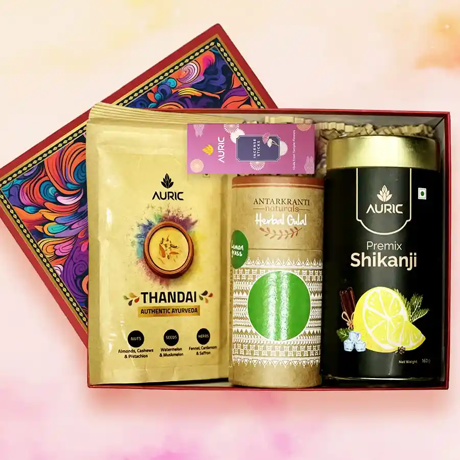 Holi Harmony Celebration Box featuring Thandai, Shikanji premix, vibrant color tubes, and fragrant agarbatti in a beautifully packaged box.