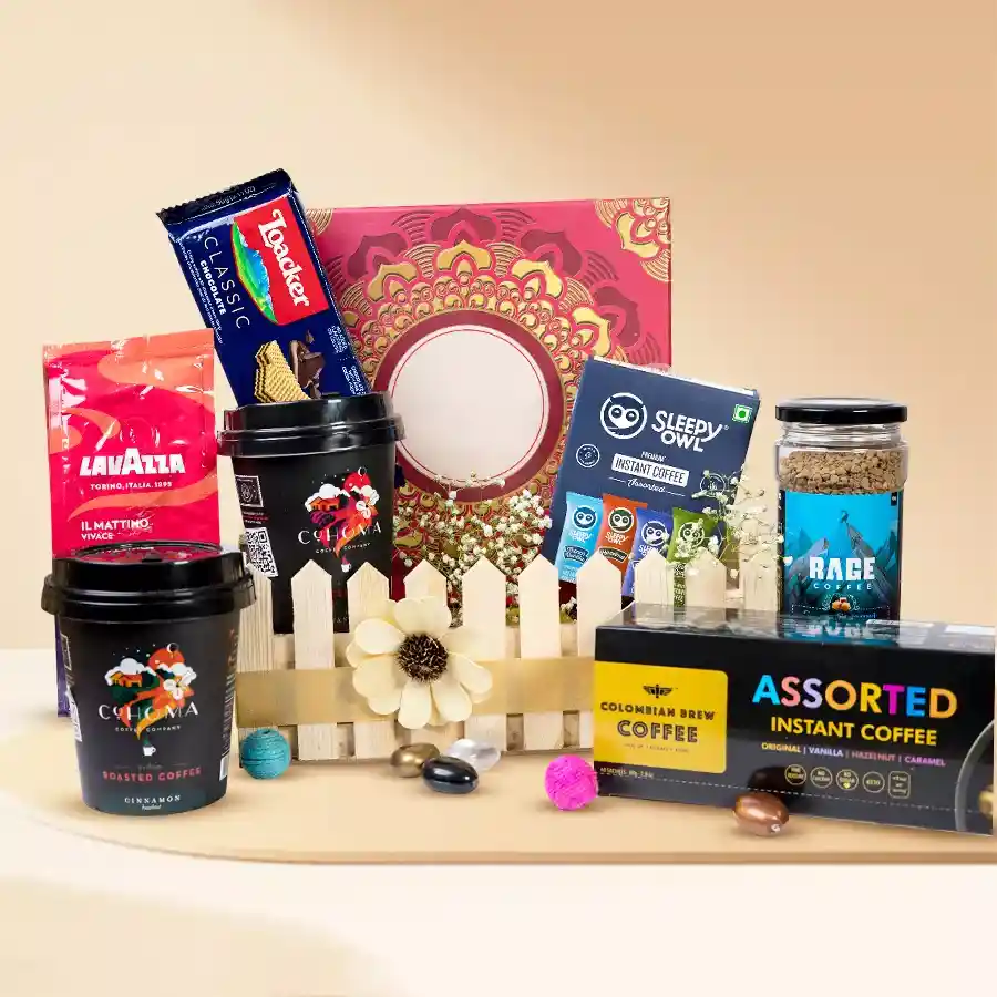 Premium Coffee and Chocolates Assortment Hamper featuring Lavazza ground coffee, Rage Coffee Creme Caramel, Loacker Classic Chocolate Wafers, Colombian Brew, Cohoma’s Cinnamon & Vanilla coffee, and Sleepy Owl’s instant blends in a reusable basket.
