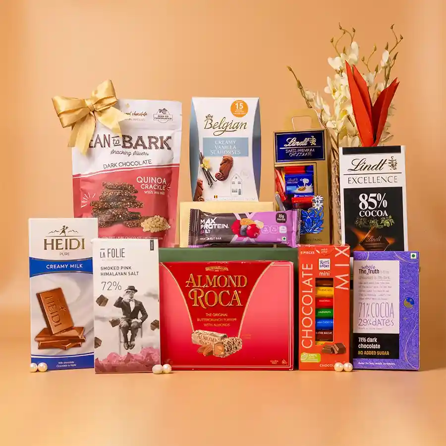 Luxe Chocolate Indulgence Hamper featuring gourmet chocolates and treats in a stylish basket