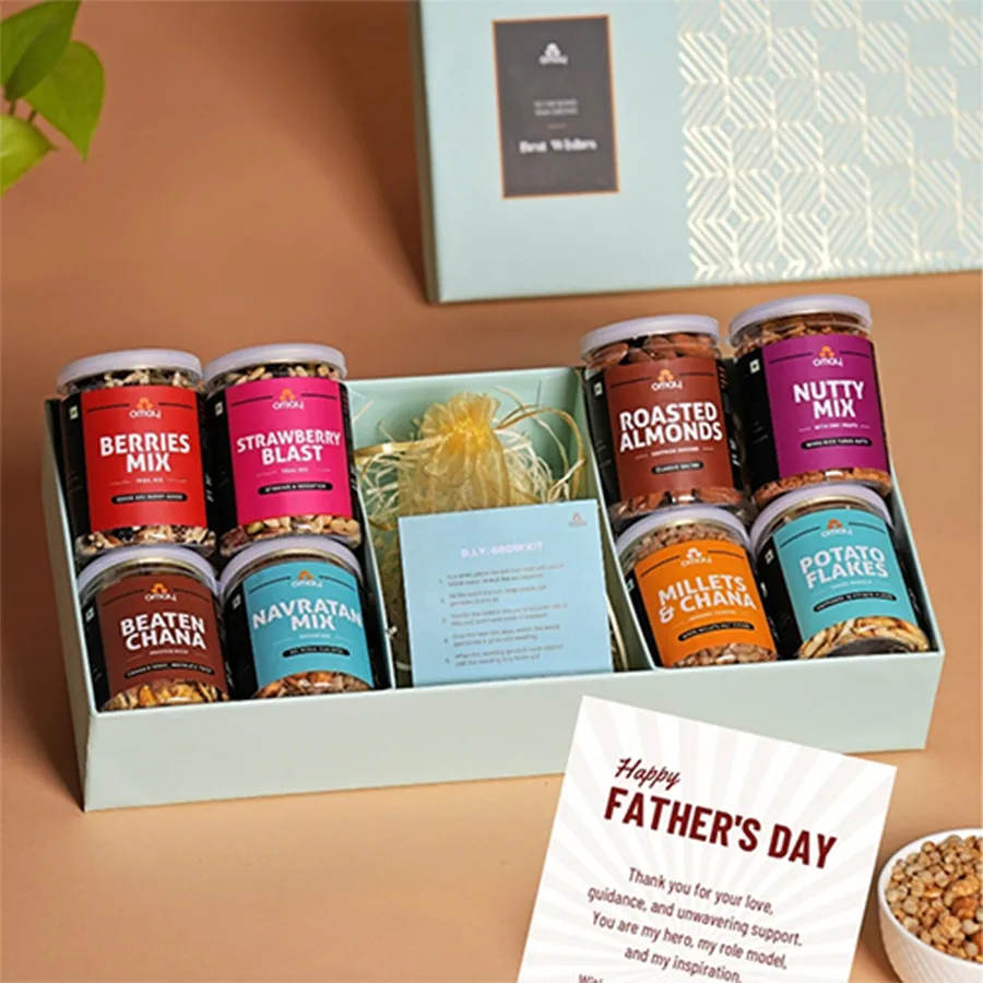 Delicious Father's Day snacks hamper featuring Saffron Almonds, Berry Mix, and a DIY Grow Kit, presented with a heartfelt greeting card.