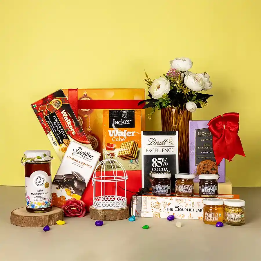 Deluxe Chocolate and Cookie Lovers Gift Set featuring a variety of chocolates, cookies, and biscuits in an elegant package.
