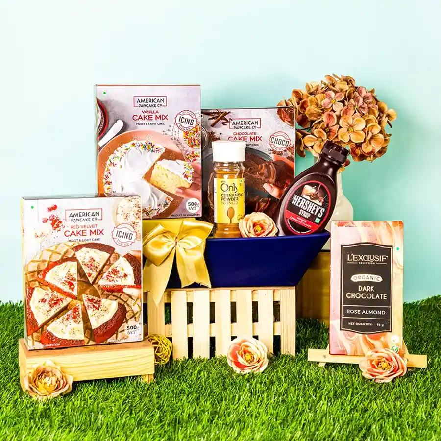 Exquisite Cake Mix and Chocolate Syrup Combo featuring three cake mixes and chocolate syrup on a bright kitchen counter