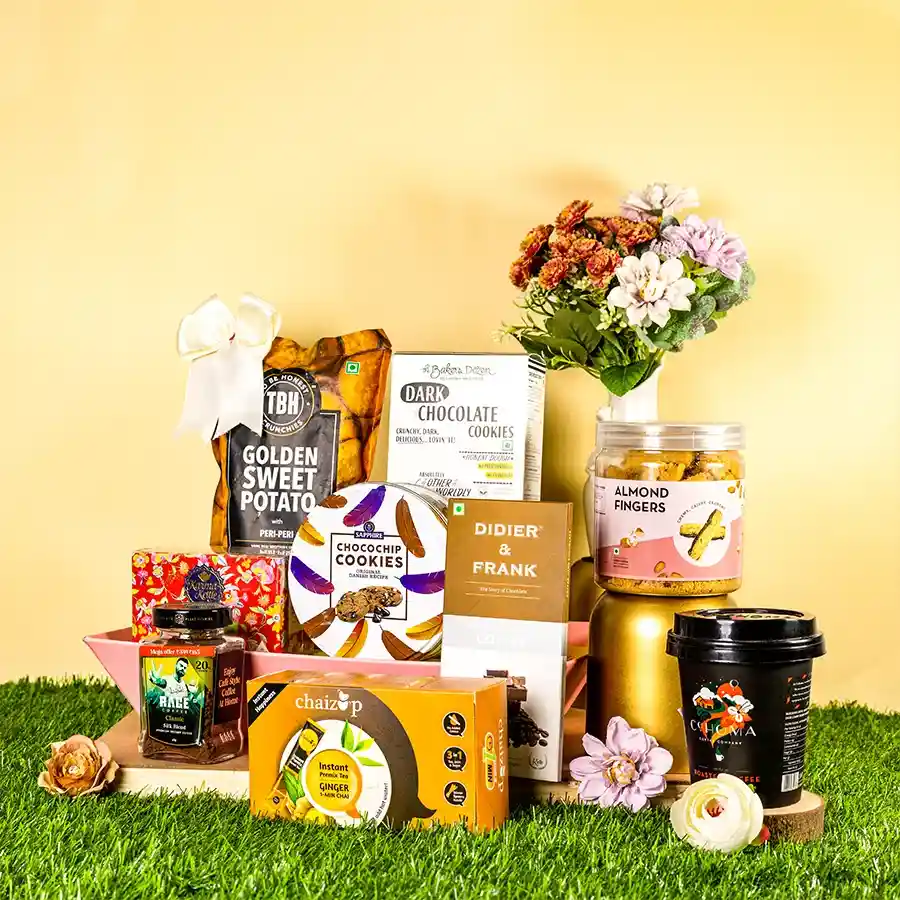 Luxury gourmet cookie and treat hamper featuring cookies, chips, and coffee and tea selections.