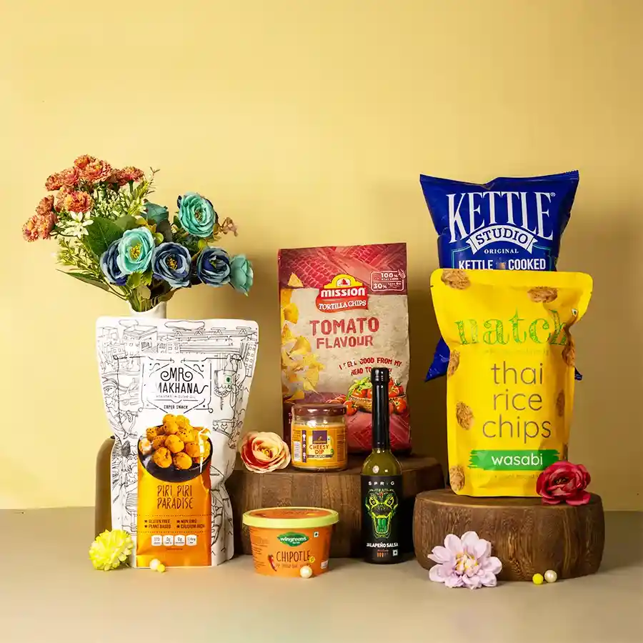 Indulgent Snack N Dip Gift Hamper with various snacks and dips arranged in a basket
