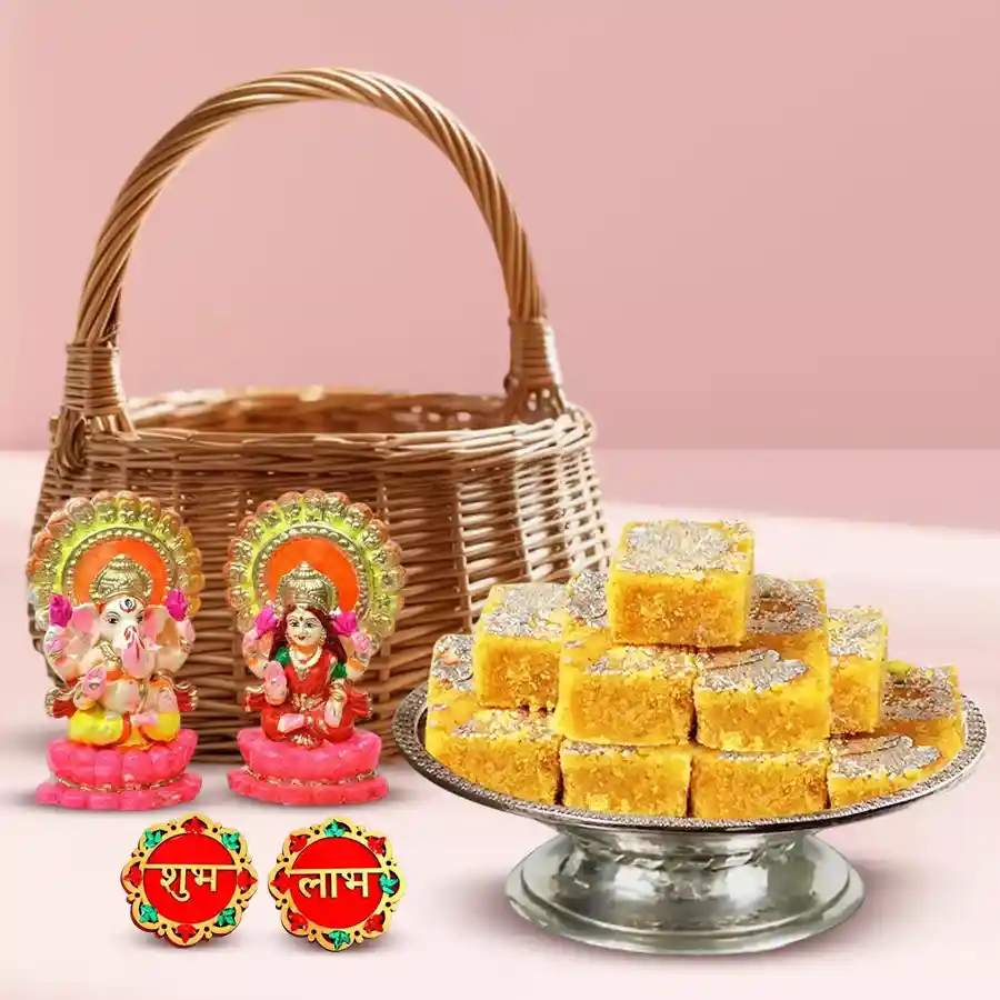 Diwali Decor N Delight Gift Basket with handcrafted clay Laxmi and Ganesh murtis, Dilkhushal treats, Shubh Labh stickers, and a stylish reusable basket