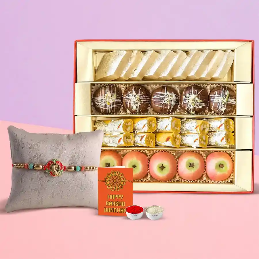 Irresistible Fondness hamper featuring Haldiram sweets, a Rakhi, and festive ingredients like Roli, Tilak, and Chawal, beautifully packaged for Raksha Bandhan celebration.