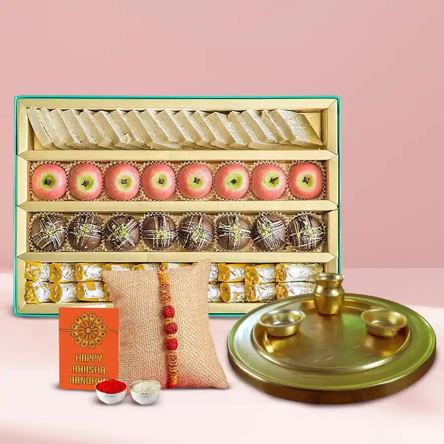 Fantastic Rudraksha Rakhi with golden Rakhi Thali and assorted sweets combo for Raksha Bandhan celebration