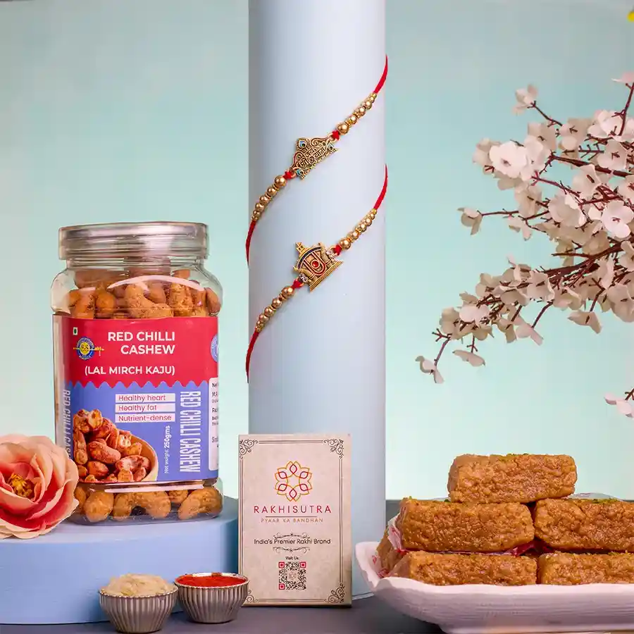 Divine Rakhis Sweet & Savory Combo with Rakhis, Mini Milk Cake, Red Chilli Cashews, Roli, Tika, Chawal, and a heartfelt message card