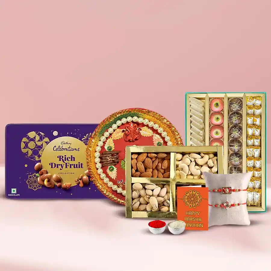 Cadbury Dry Fruit Box with Haldiram's assorted sweets, designer Rakhi, Rakhi Thali, Roli, Tilak, and a message card for Raksha Bandhan celebration