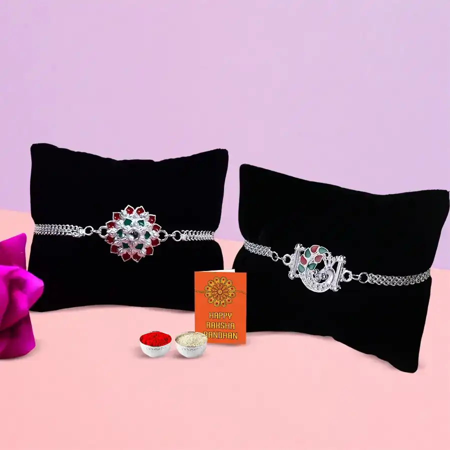Elegant silver plated twin Rakhi set with Roli, Tilak, and Chawal