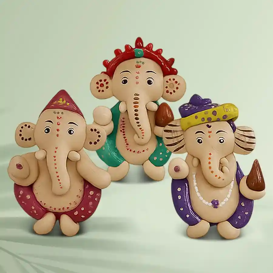 Handmade Ganesh fridge magnets set of 3 with intricate Dot Mandala artwork on clay, featuring vibrant colors and a spiritual design.