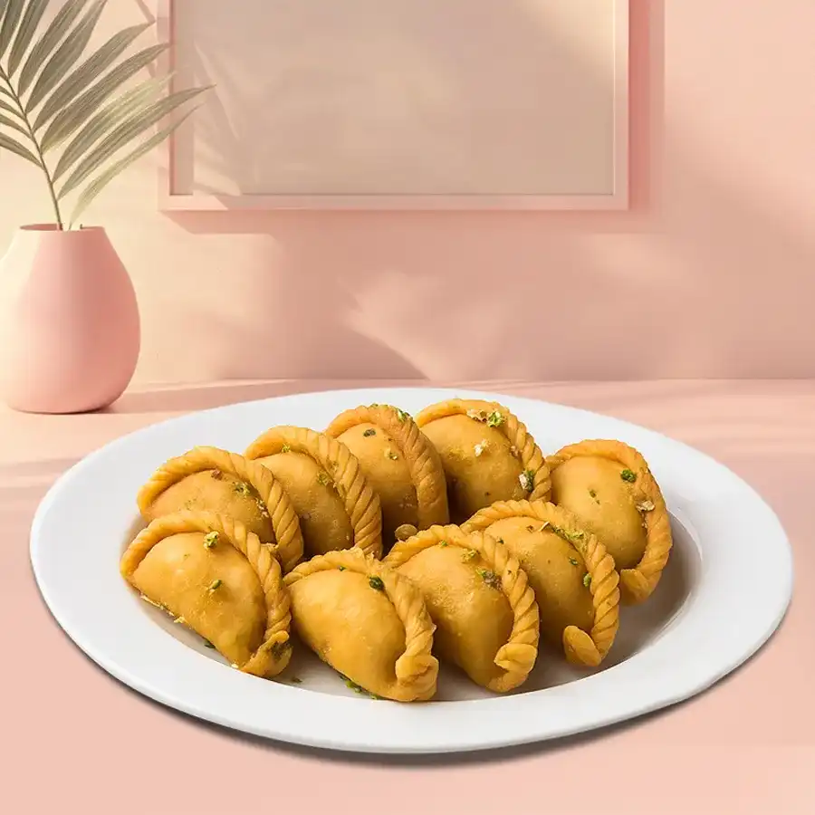 Half-kilogram pack of Haldiram's Tasty Khowa Puri, featuring golden, crunchy snacks, perfect for sharing or enjoying alone.
