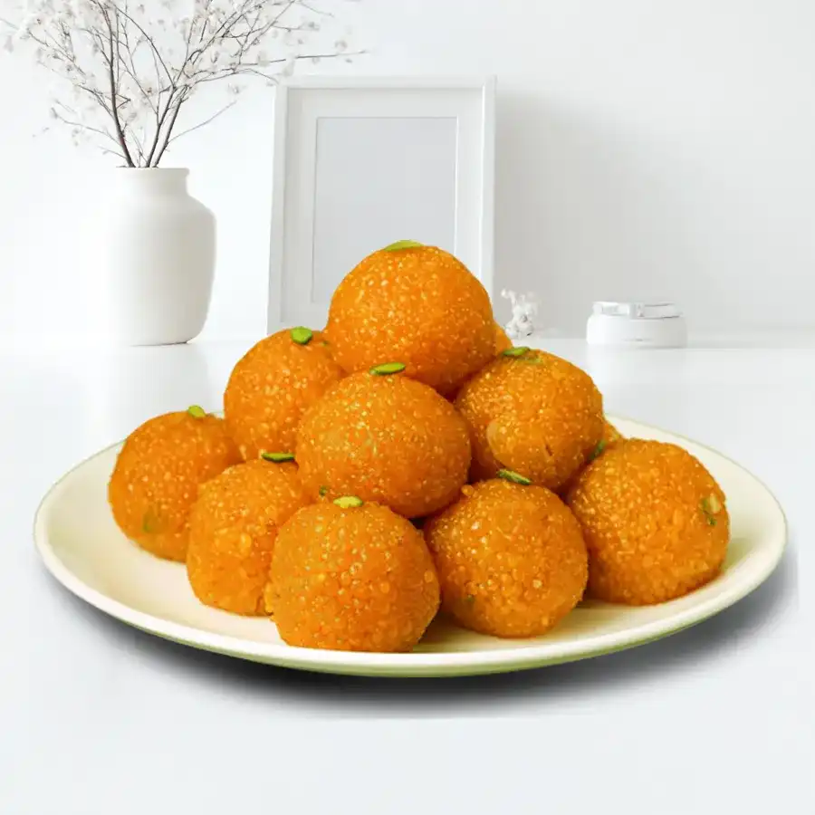 Haldirams Kesaria Ladoo ½ kg pack displayed with multiple ladoos arranged neatly