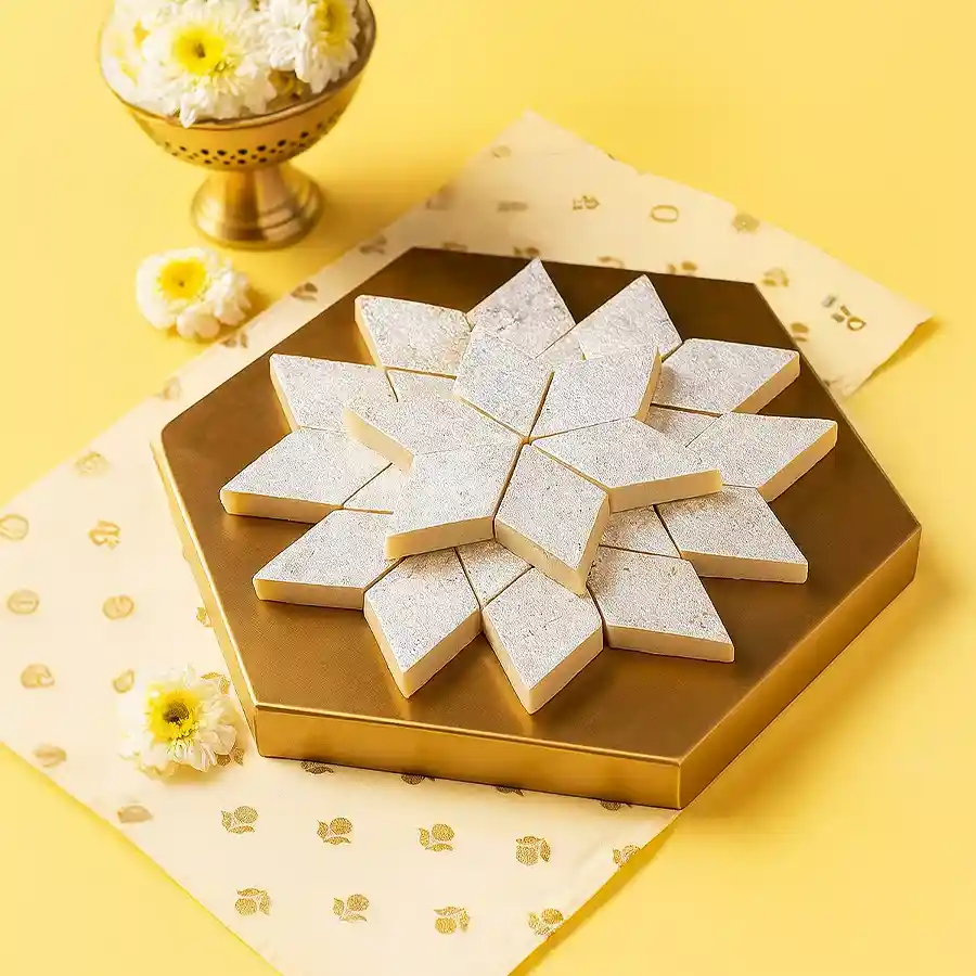 Kaju Katli from Haldiram beautifully arranged with a pack of crispy Bhujia