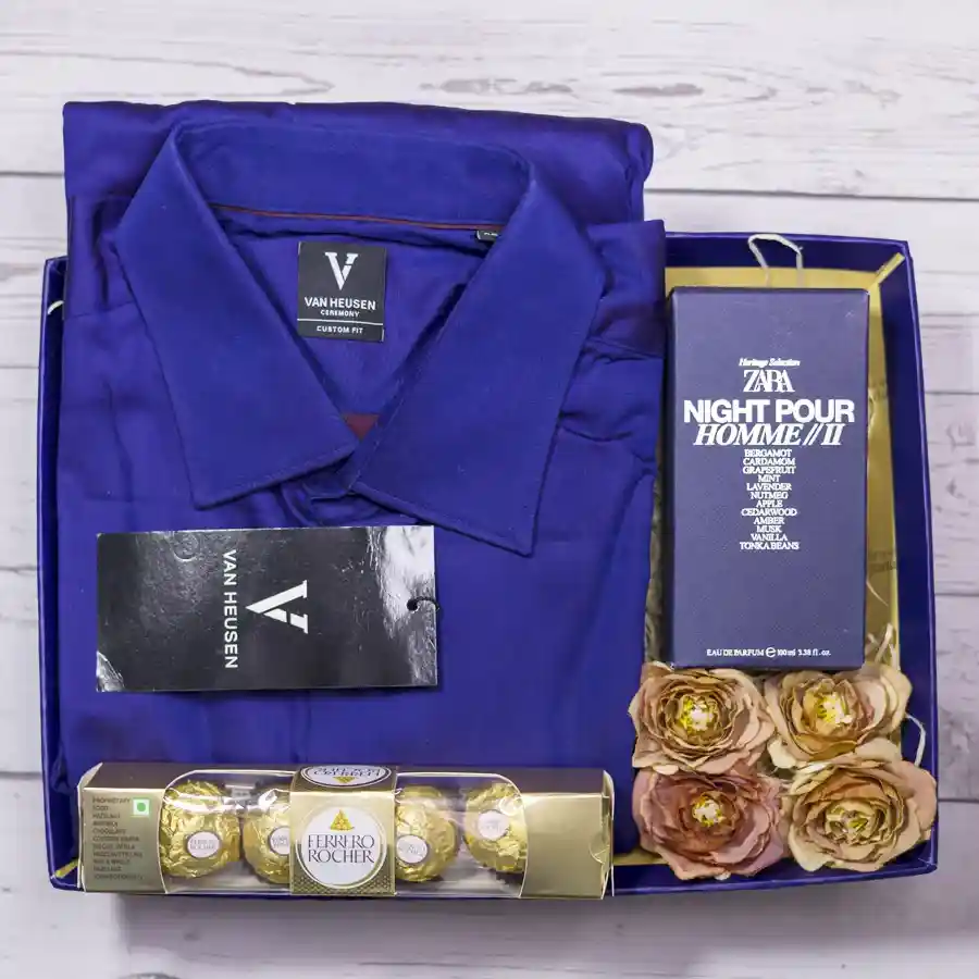 Chic Men’s Gift Ensemble featuring a blue shirt, Zara Night Pour Homme fragrance, and Ferrero Rocher chocolates on a designer tray.