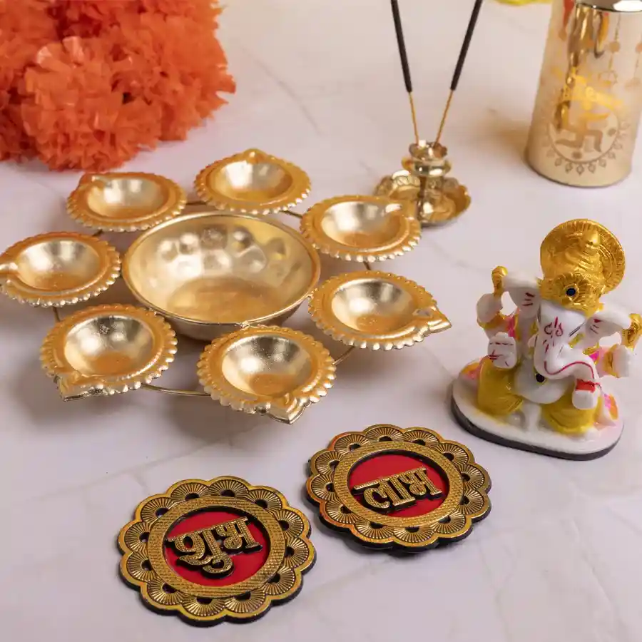 Divine Diwali Delight Gift Set featuring diya-shaped Urli Bowl, Mukut Ganesh statue, and vibrant Subh Labh Sticker