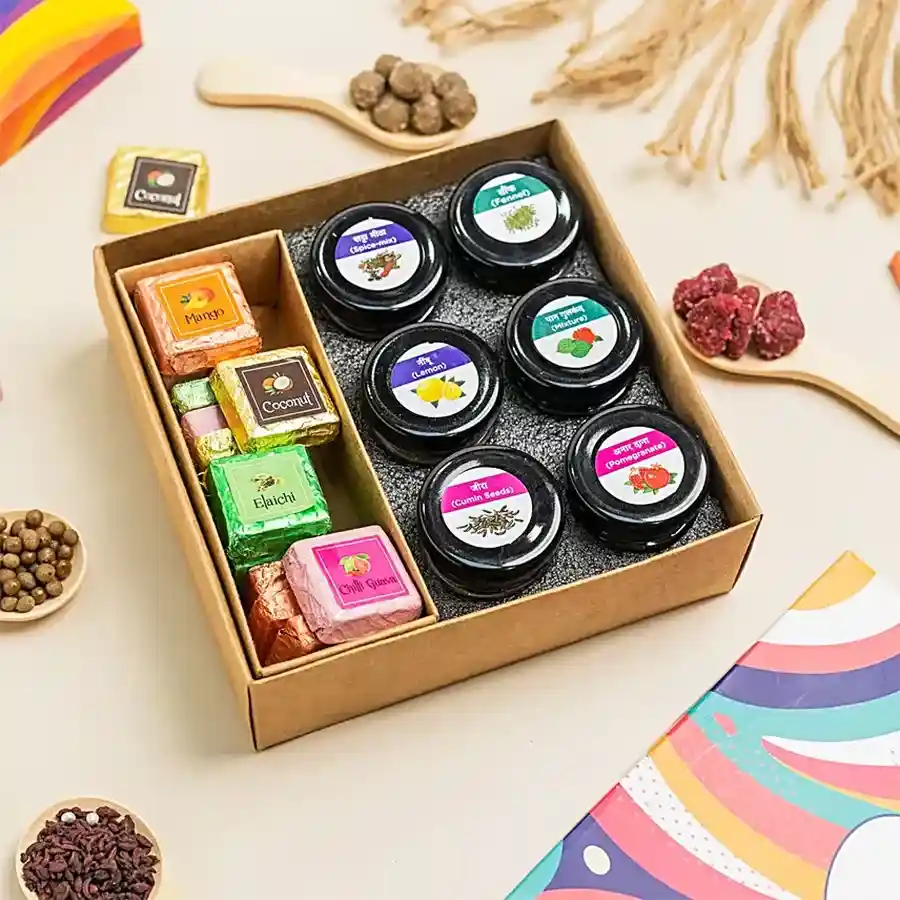 Delectable Chocolates and Assorted Mukhwas Gift Pack featuring handmade Mukhwas flavors and assorted chocolate bites displayed in an elegant arrangement.