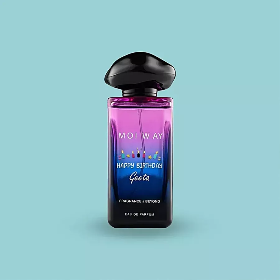 Sophisticated musky perfume bottle with elegant design surrounded by flowers and gift box for a birthday occasion.