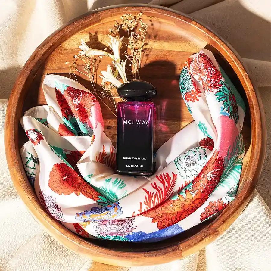 Enchanting Perfume and Scarf Gift Set featuring a luxury floral perfume bottle and a stylish scarf in an elegant presentation box