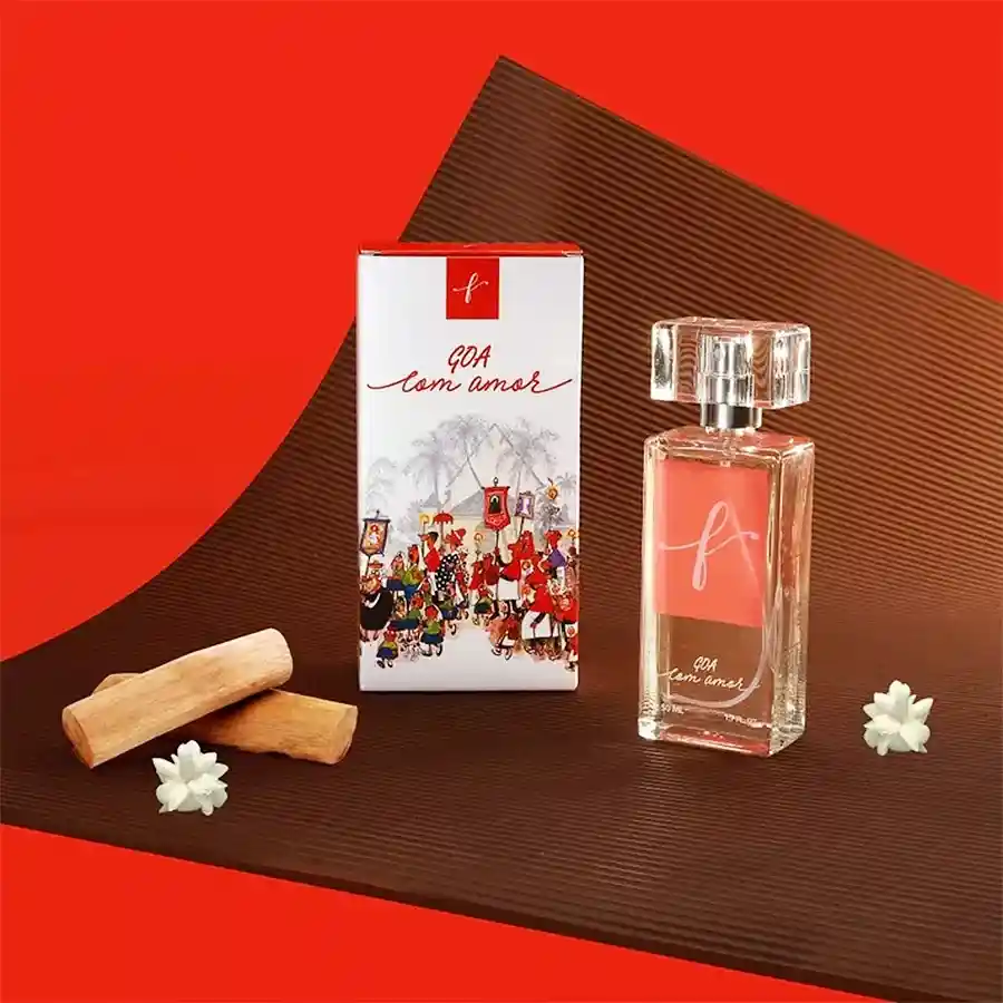 Tropical Bliss Goa Com Amor Perfume bottle with colorful packaging featuring Mario Miranda's sketches