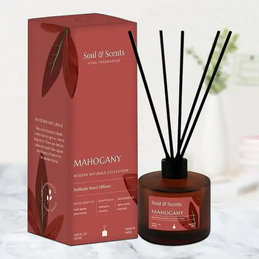 Tranquil Mahogany Essence Reed Diffuser Set with 120 ml bottle and 6 fiber reeds in a serene setting