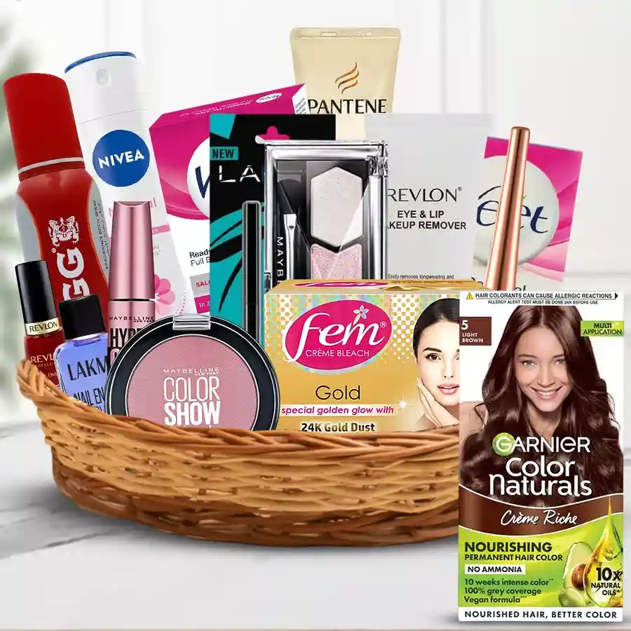Lovely Gift Basket featuring beauty essentials from Maybelline, Lakme, and Revlon, including blushes, nail colors, body sprays, and hair removal kits, beautifully presented for gifting.