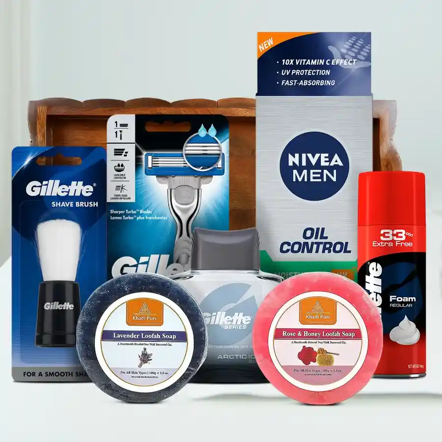 Appealing Grooming Hamper for Men featuring a wooden tray filled with Nivea Men’s Oil Control Moisturizer, Khadi Natural soaps with loofah, and a complete Gillette shaving set.