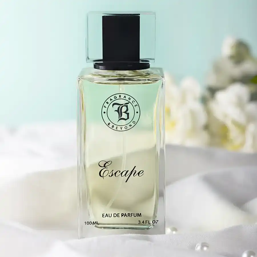 Enchanted Blossom Eau de Parfum bottle surrounded by floral elements