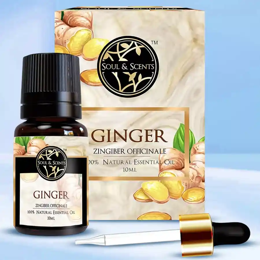 A 10ml bottle of Aromatic Ginger Essential Oil surrounded by fresh ginger root and herbs on a wooden surface.
