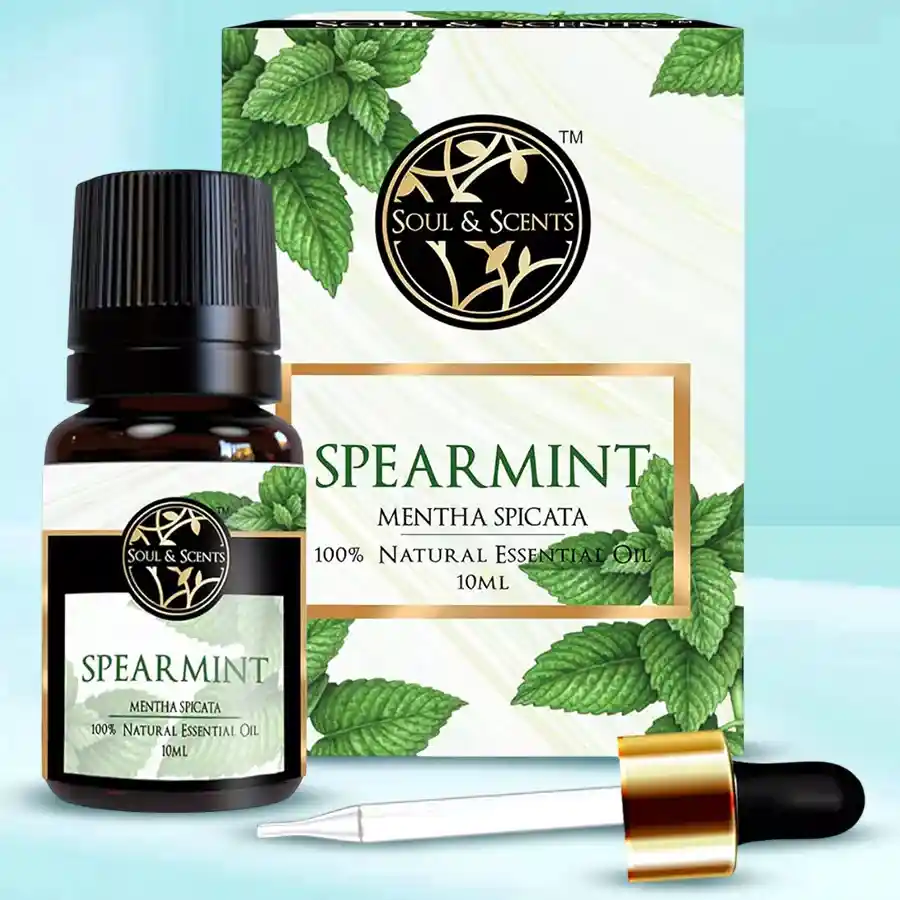 Luxurious Spearmint Essential Oil 10ml bottle with a fresh mint leaf background