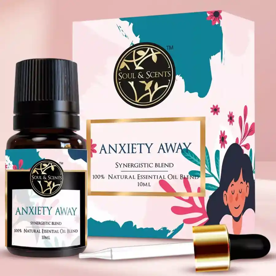 Bottle of Divine Anxiety Away Essential Oil with a calming background