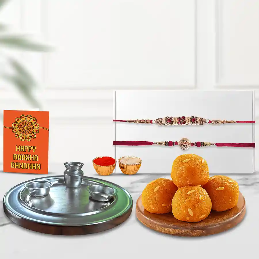 Pride to Possess Silver Plated Thali with Haldiram Ghee Ladoo & 2 Designer Rakhi and Roli Tilak Chawal