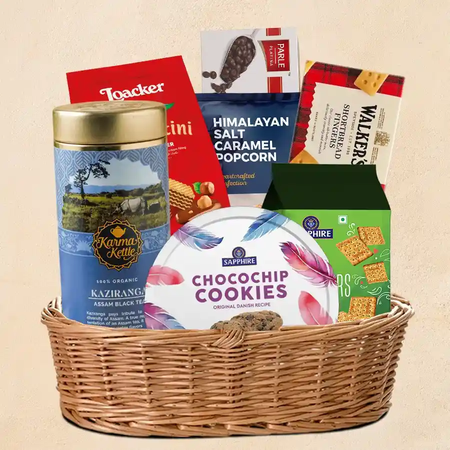 Mouth-Watering Assam Tea N Assortment Delicacy Gift Basket
