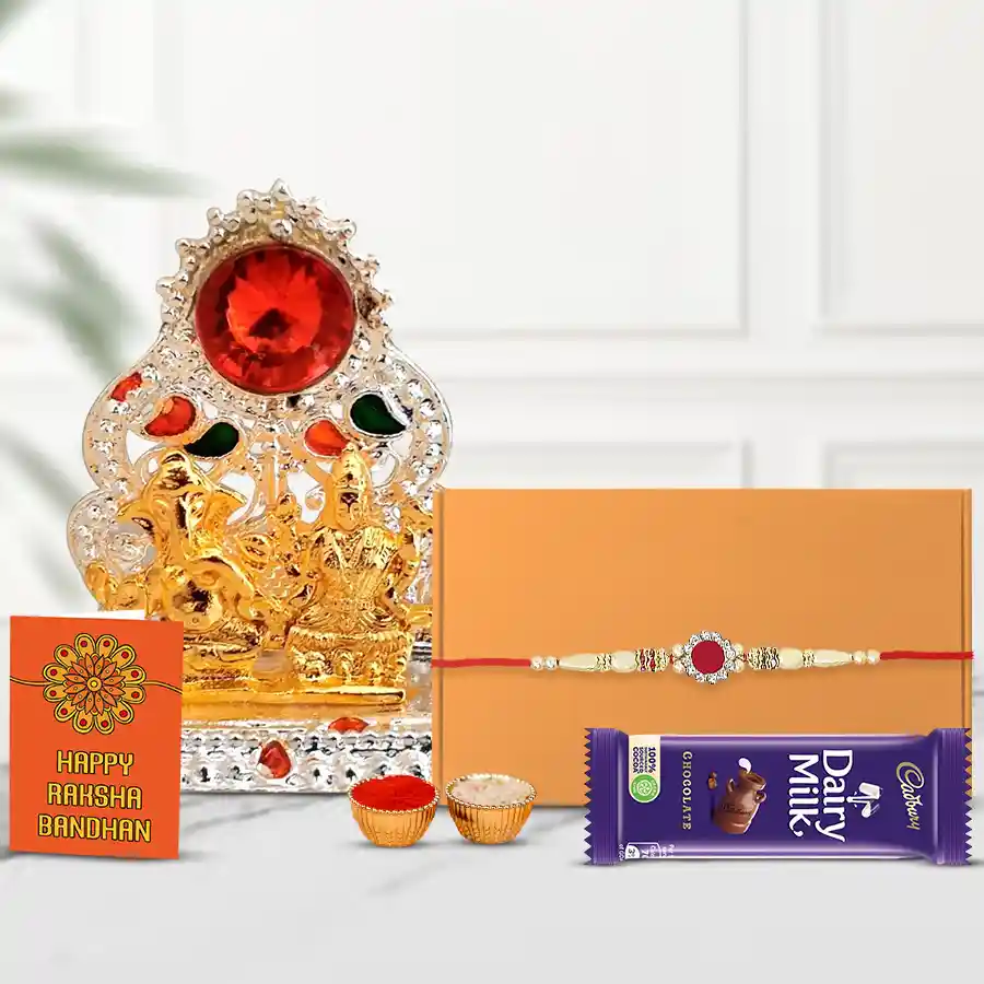 Silver Plated Mandap with Golden Ganesh Laxmi Idol and Cadbury Dairy Milk Chocolate with Rakhi and Roli Tilak Chawal