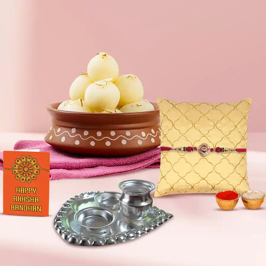 Appealing Thread Rakhi N Haldiram Rosogolla with Silver Plated Thali