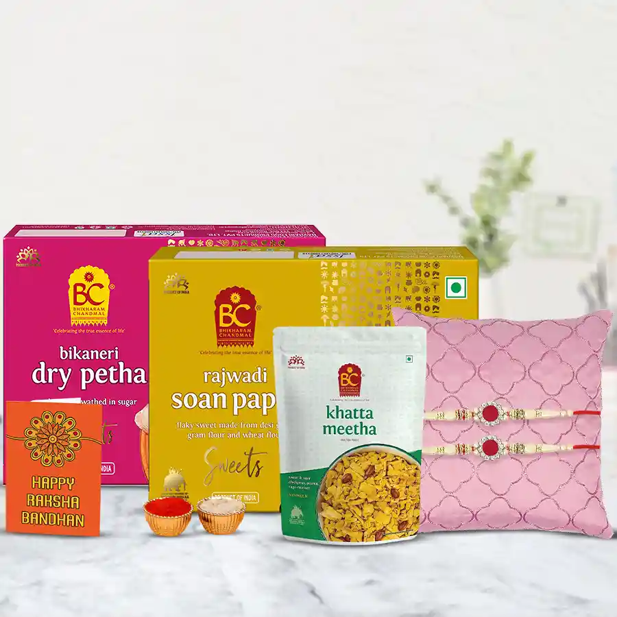 Fabulous Stone Rakhi Pair with Sweets N Snacks from Bhikaram