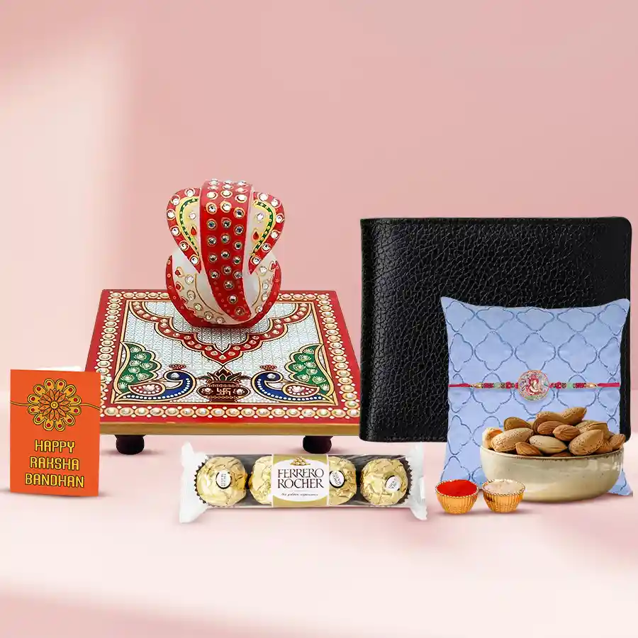 Holy Ganesh Rakhi gift pack featuring a Ganesh Rakhi, a 4x4” marble chowki, a brown leather wallet, Ferrero Rocher chocolates, and premium almonds with a free Roli Tika, Chawal, and a personalized Rakhi card.