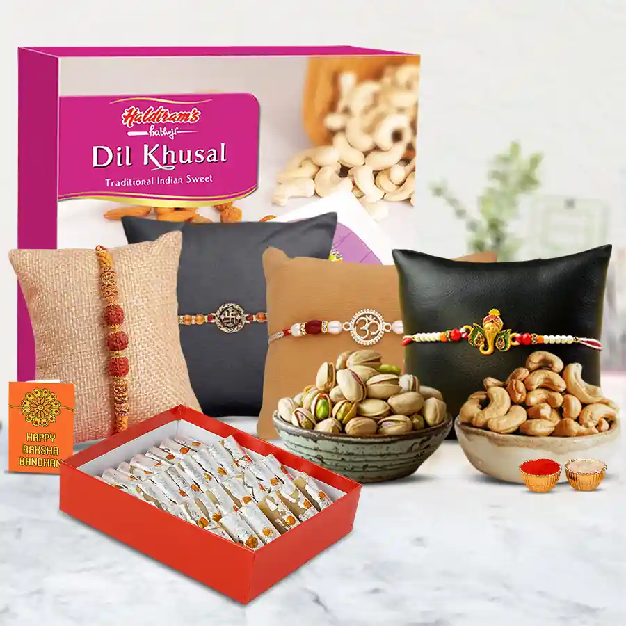 Exquisite set of 4 rakhis featuring Om, Swastik, Ganesh, and Rudraksha designs alongside Haldiram sweets and assorted dry fruits in an elegant packaging