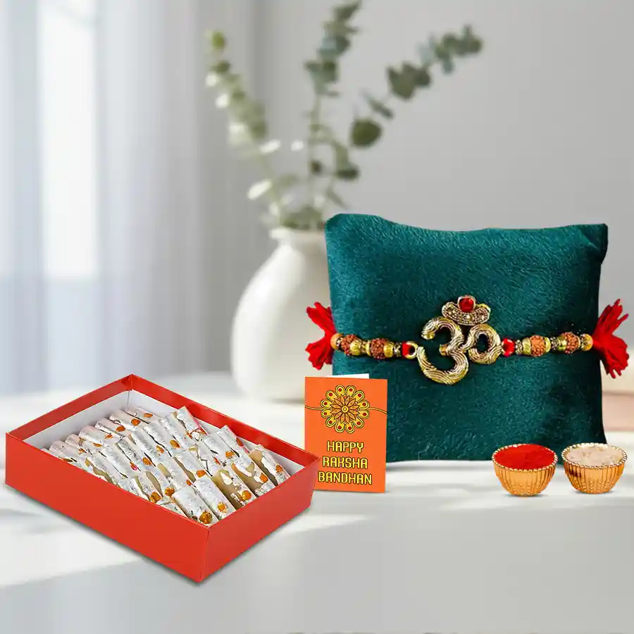 Cool OM Ganesh Fusion Rakhi with Haldiram sweets and Cadbury Eclairs