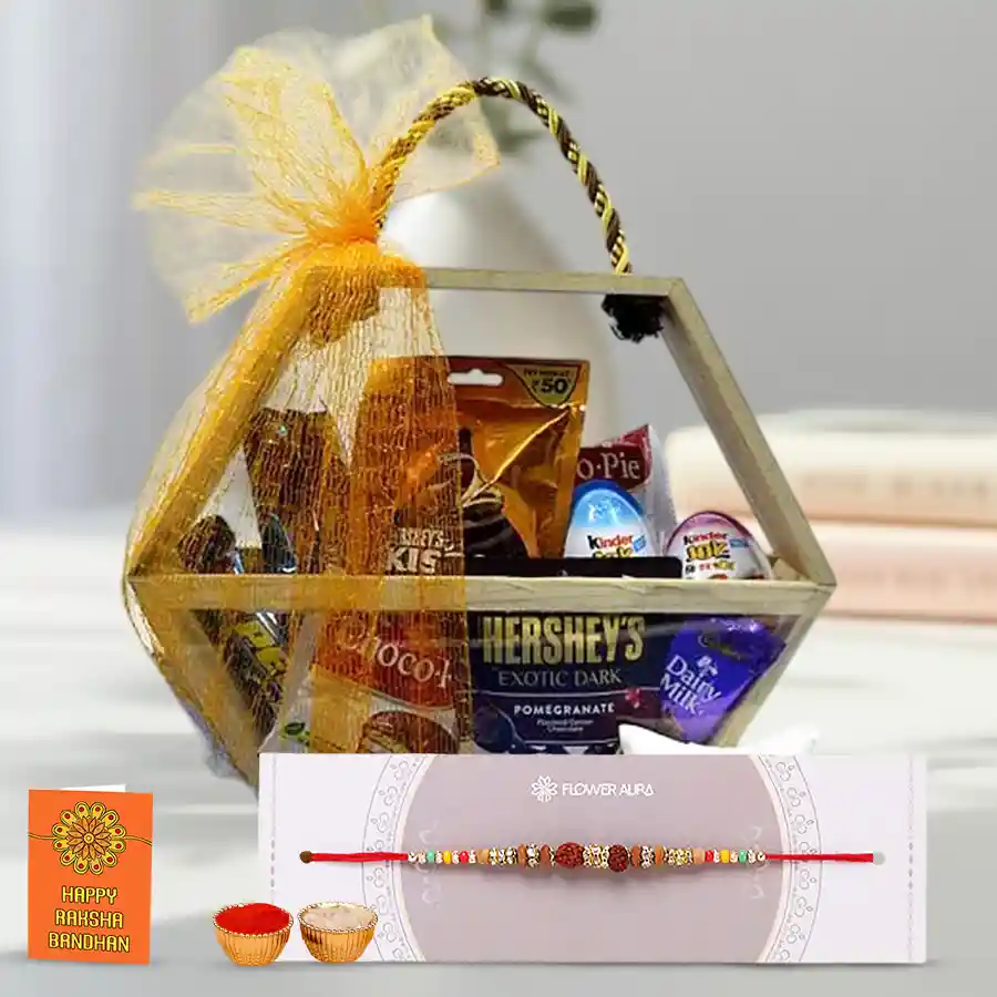 Rakshabandhan gift basket for kids featuring chocolates, a Rudraksha Rakhi, and traditional items in a hexagonal wooden basket