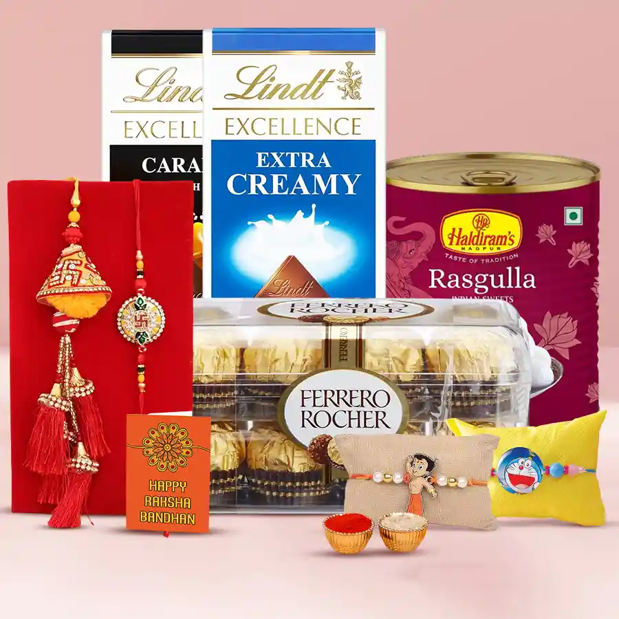 Family Rakhi set with chocolates including Lindt bars, Ferrero Rocher, and Haldiram Rasgulla, beautifully arranged for Raksha Bandhan celebration.